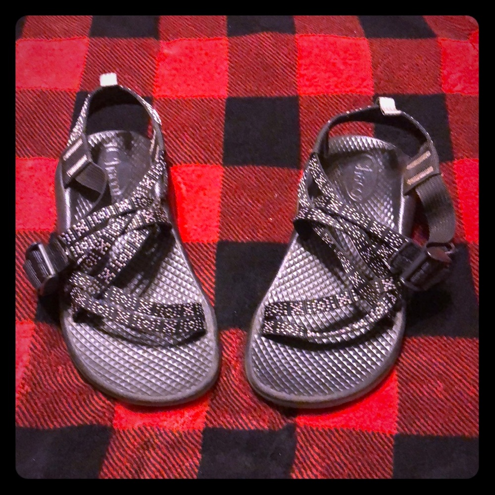 Girls black and white Chacos.